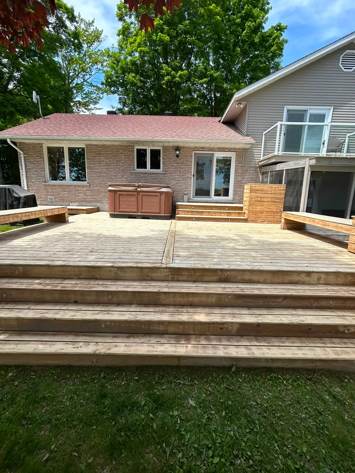 Bare backyard deck before staining